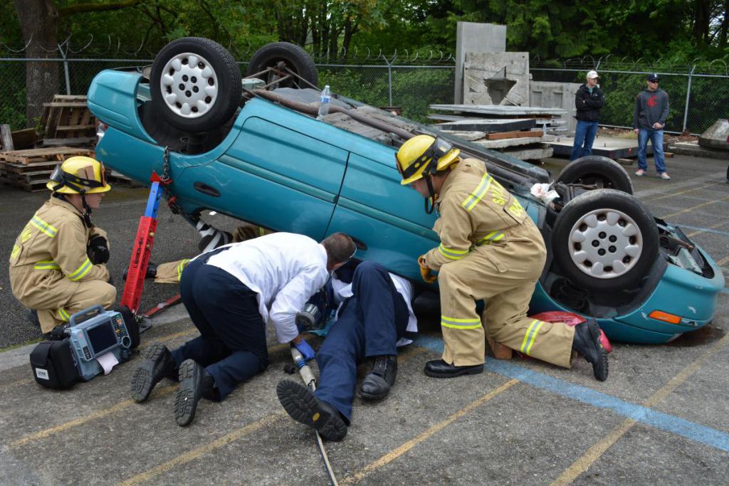 Student access the scene of an accident.